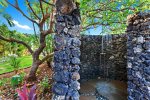 After a long sun-kissed day at the beach, no better way to wash off the salt and sand than in this custom lava rock, heated outdoor shower.